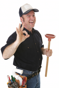 Plumber giving a thumbs-up while holding a plunger, representing plumbing services and inspections for new homeowners.